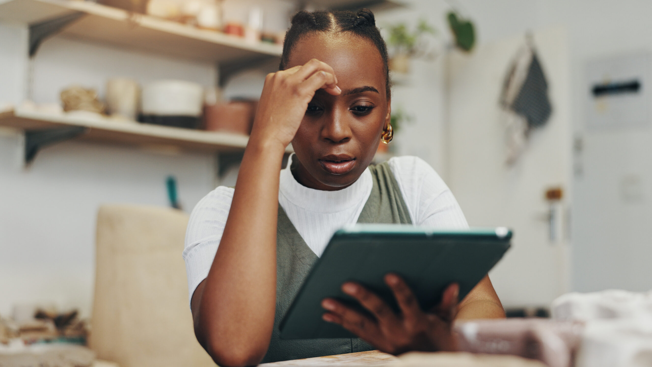 Worried, stress and woman with tablet, reading or disappointed with negative feedback or online. Review, entrepreneur and black person with app for small business, frustrated or tech for social media.